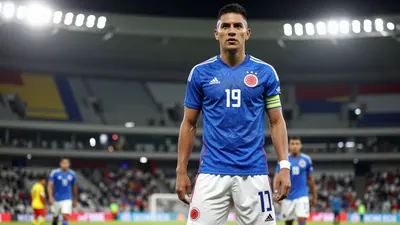 A photorealistic image of an anonymous Colombia national football team player in a blue jersey with white shorts...